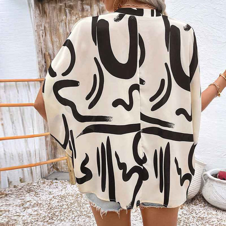 Women's Loose Fit V-Neck Blouse with Batwing Sleeves and Geometric Print
