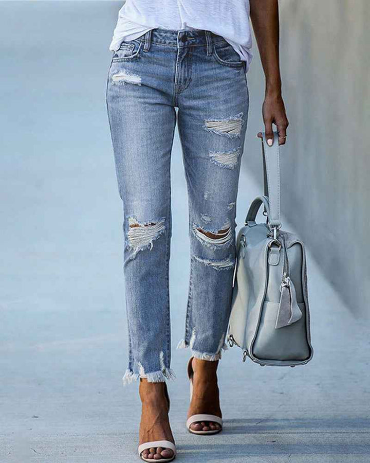 Women's Relaxed Ripped Jeans with Frayed Hem and Straight Leg Light Blue