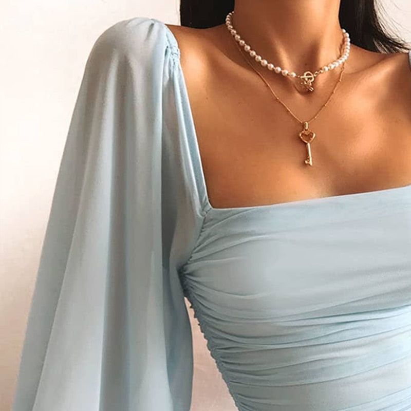 Vendra | Women's Bodycon Mini Dress with Puff Sleeves - Light Blue