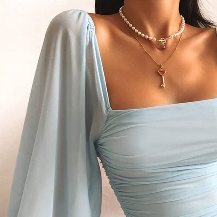 Vendra | Women's Bodycon Mini Dress with Puff Sleeves - Light Blue