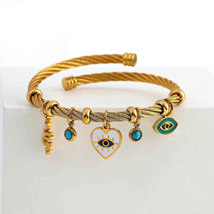 Open Cuff Bracelet with Evil Eye and Heart Charms Gold