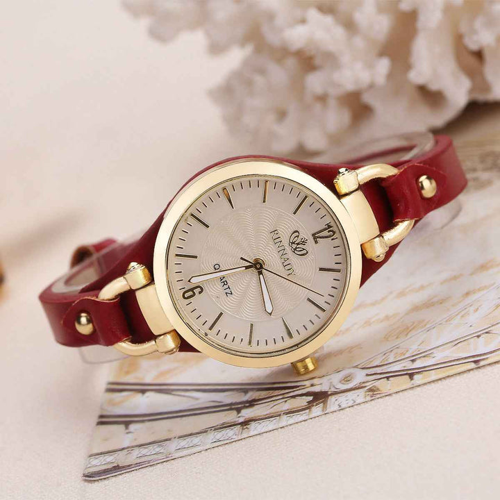 Gold-Tone Bezel Round Face Wristwatch