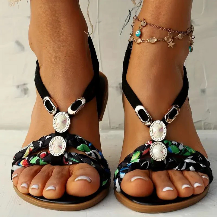 Women's Woven Flat Sandals with Floral Patterns and Jewelry Accents Black