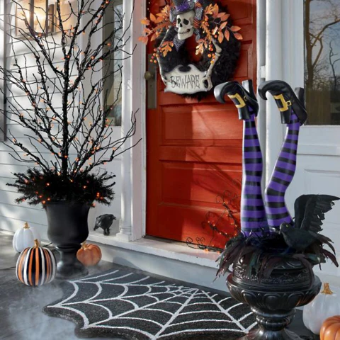 Halloween's Witch Leg Yard Stakes with Striped Design and Golden Boots, Set of 2 Purple and Black